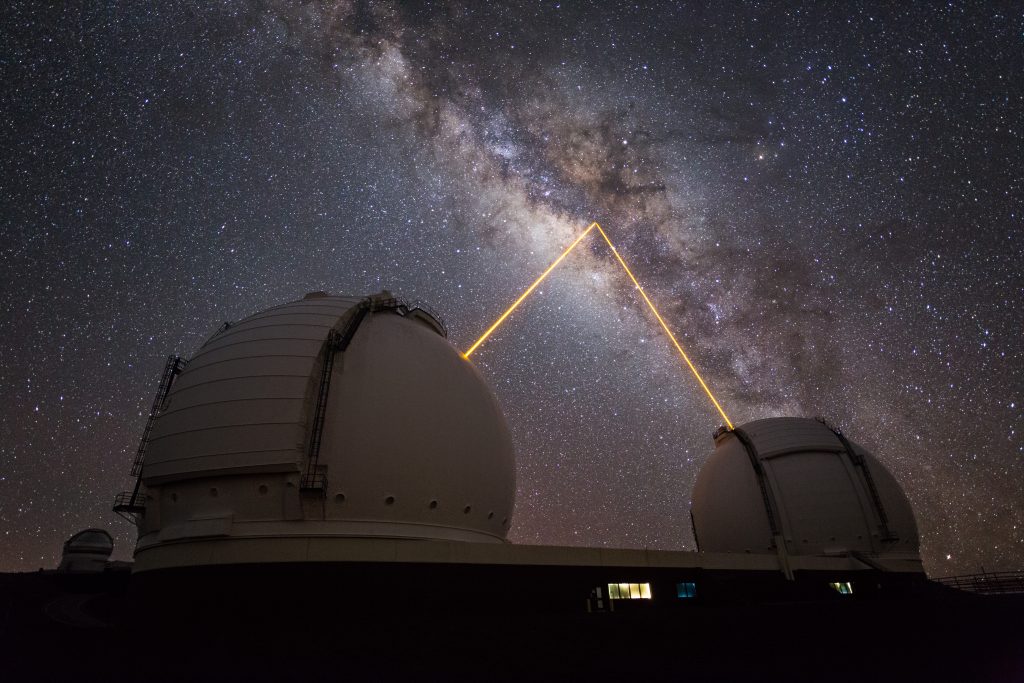 Keck Observatory telescope domes under the Milky Way